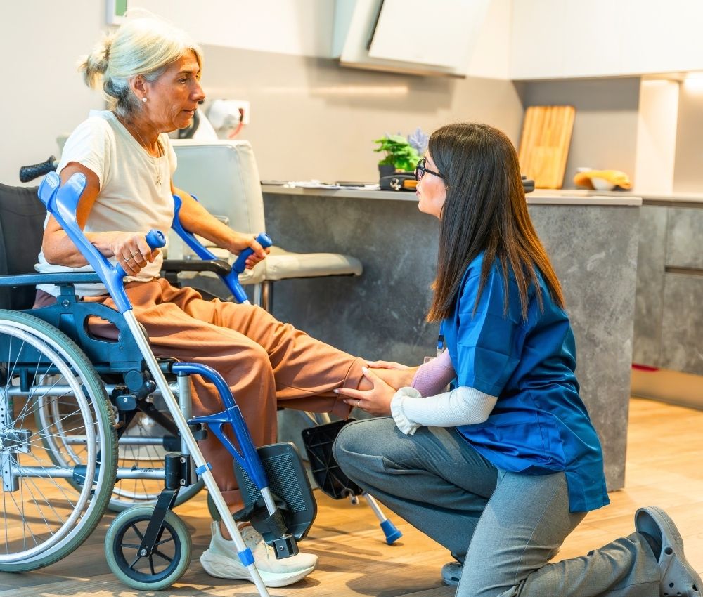 a senior woman is sitting on wheel chair